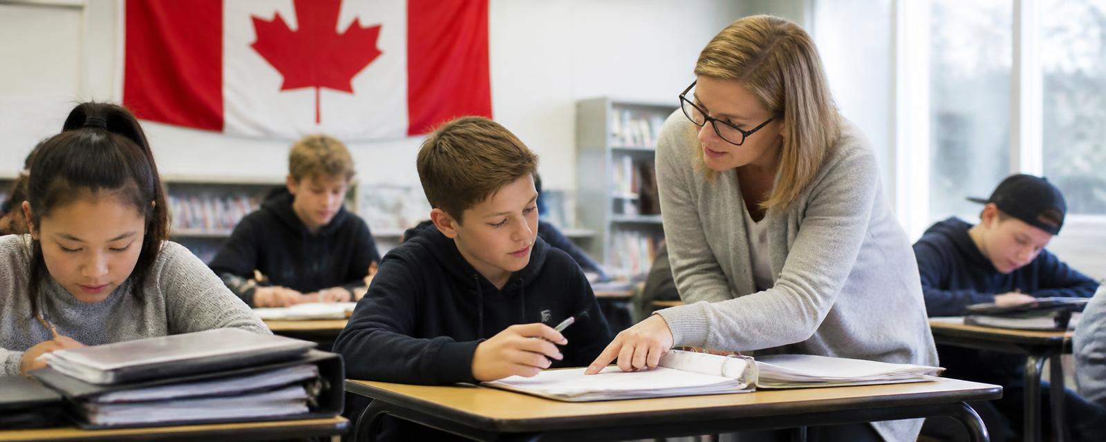 Canadian school staff reviewing board reports
